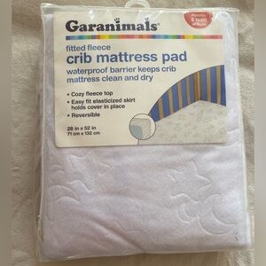 FREE with wardrobe purchase! Garanimals Waterproof Fleece Crib Mattress Pad